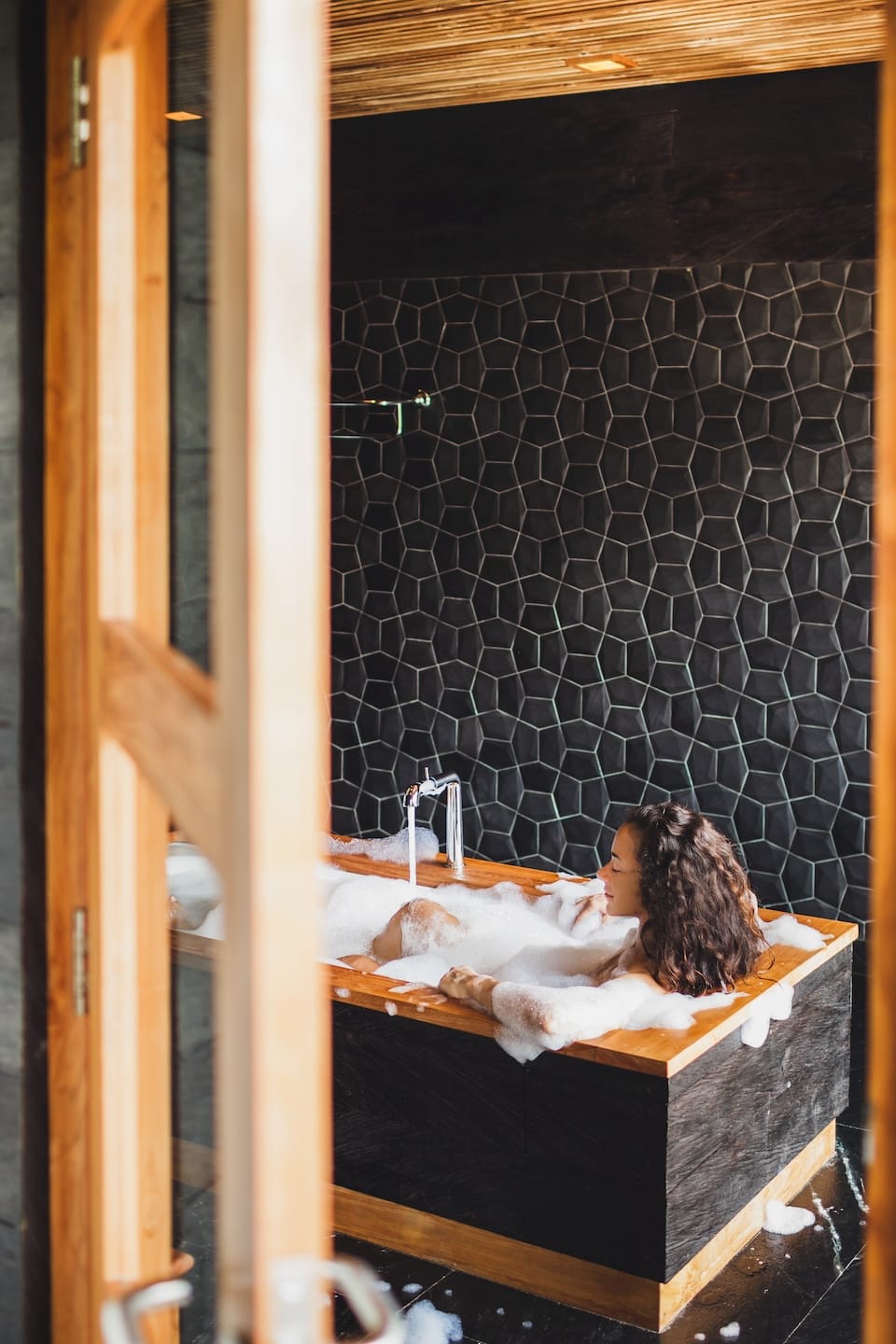 slim-beautiful-girl-enjoying-in-bath-full-of-foam-2023-11-27-05-09-04-utc